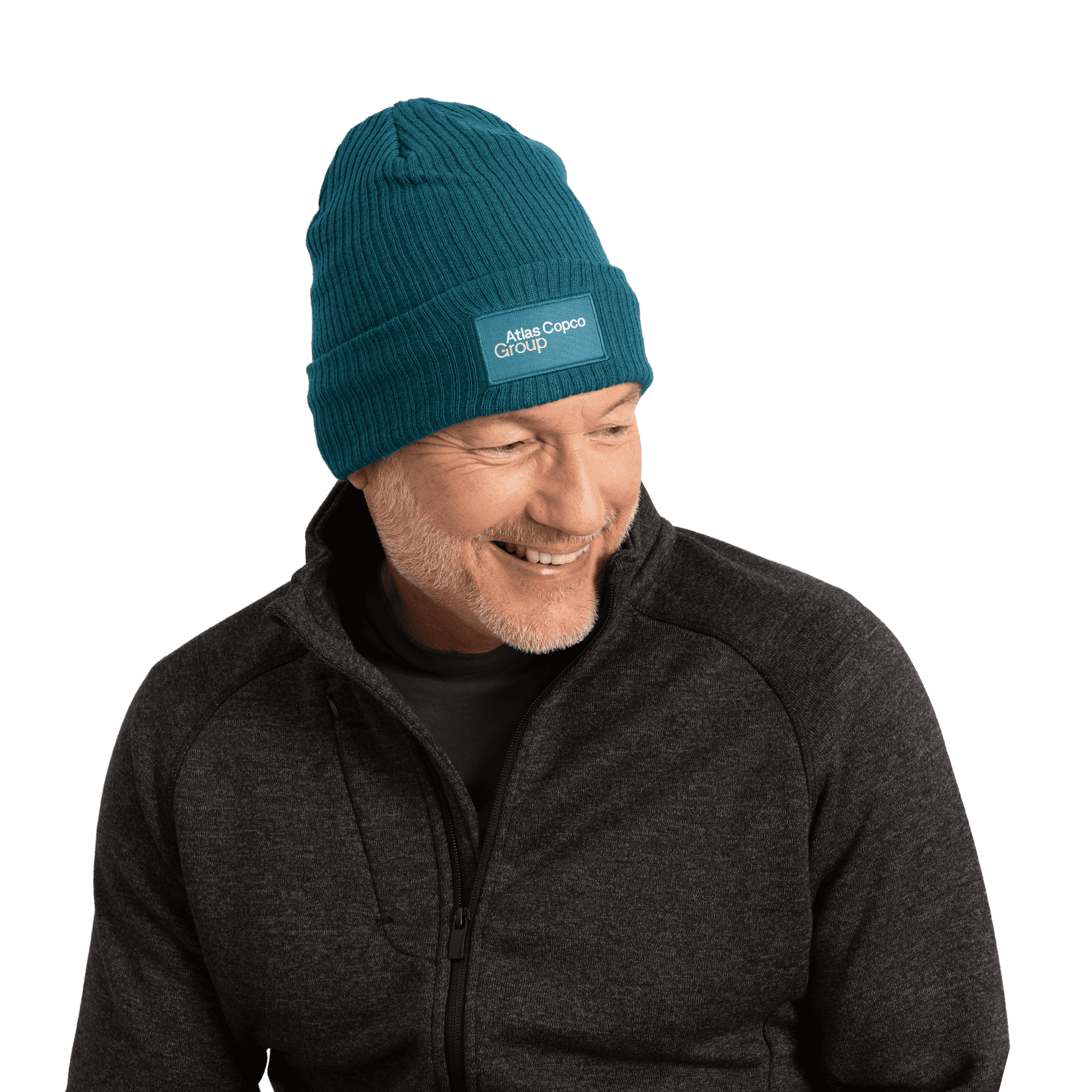 man wearing teal winter hat with atlas copco group logo