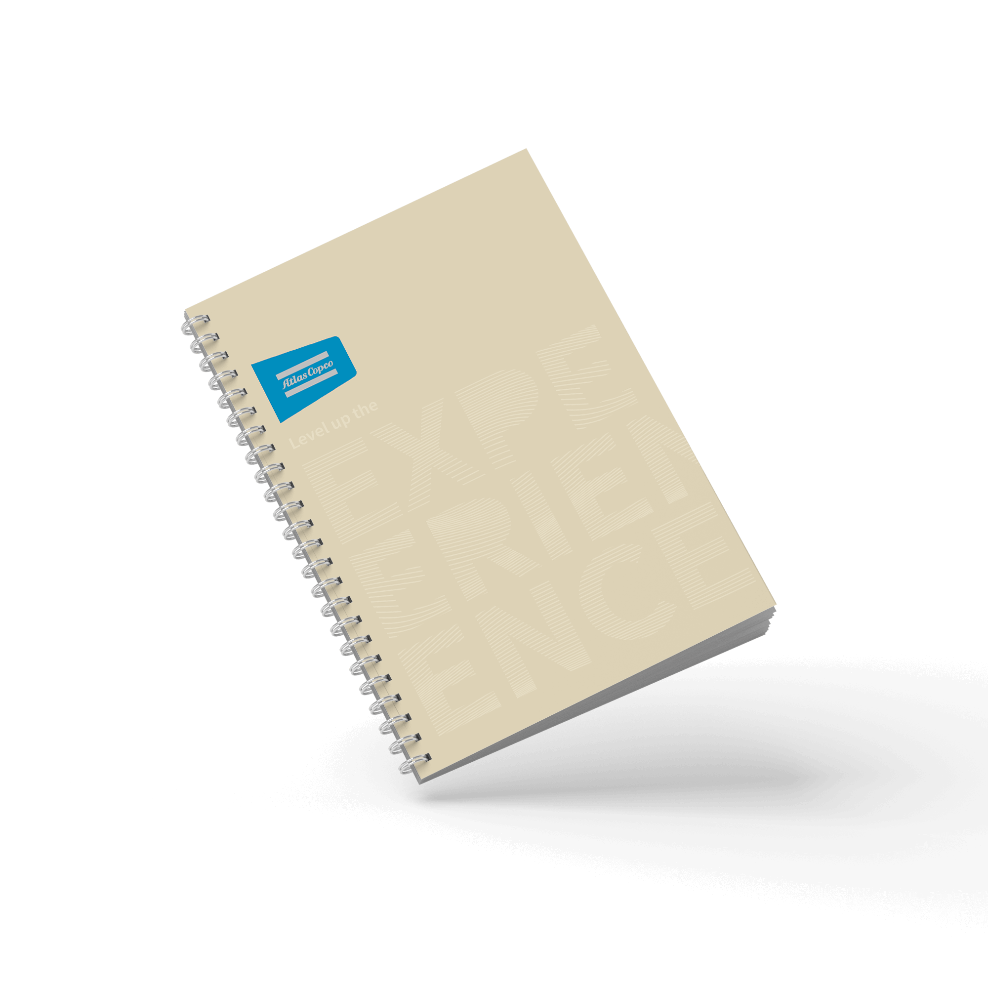 beige notebook with atlas copco logo and brand promise in beige embossed text