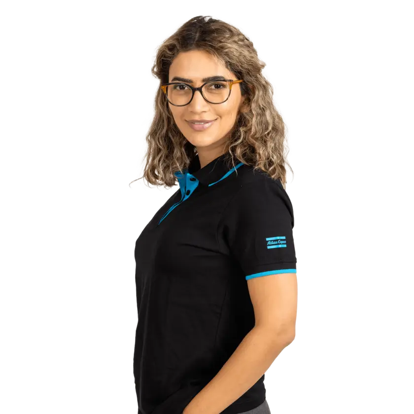 woman wearing black polo shirt with blue details and atlas copco logo on sleeve