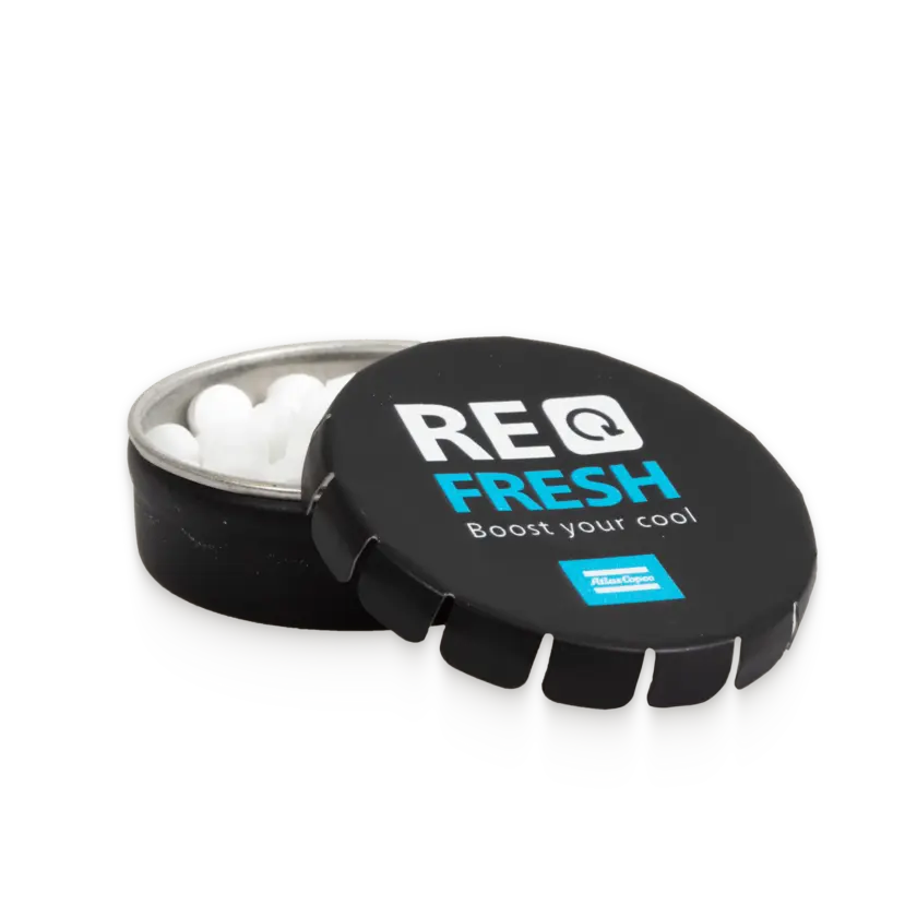 mint pastilles with atlas copco logo and text refresh