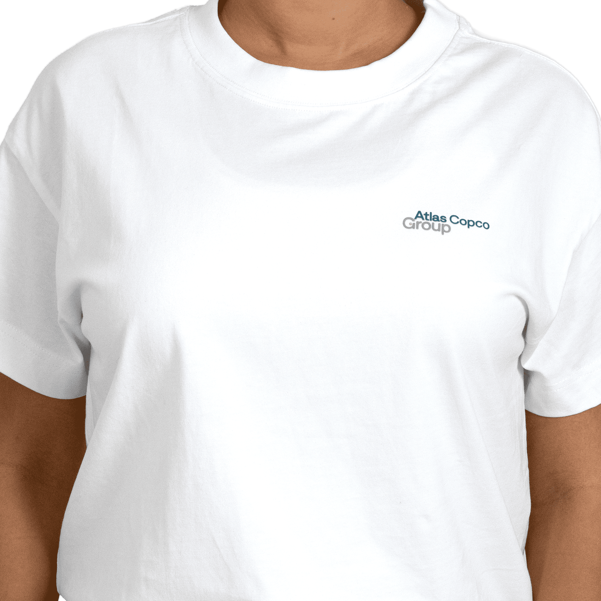 woman wearing white tshirt with atlas copco group logo